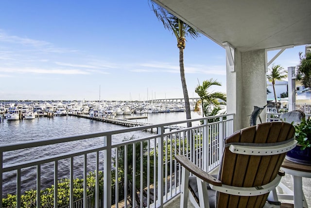 balcony featuring a water view