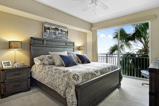 bedroom featuring access to exterior, light colored carpet, and ceiling fan