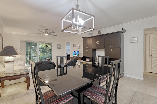 tiled dining area featuring ceiling fan with notable chandelier and ornamental molding