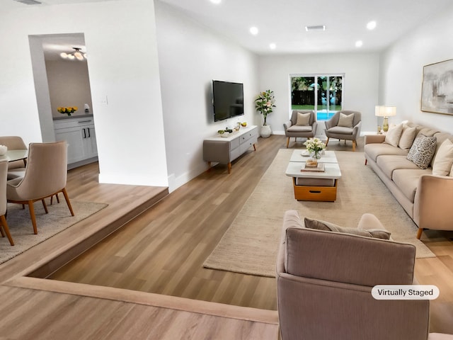 living room featuring light hardwood / wood-style floors