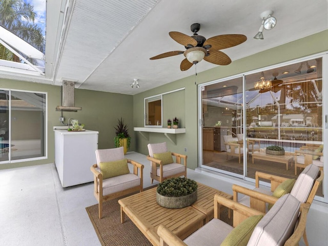 view of patio with ceiling fan