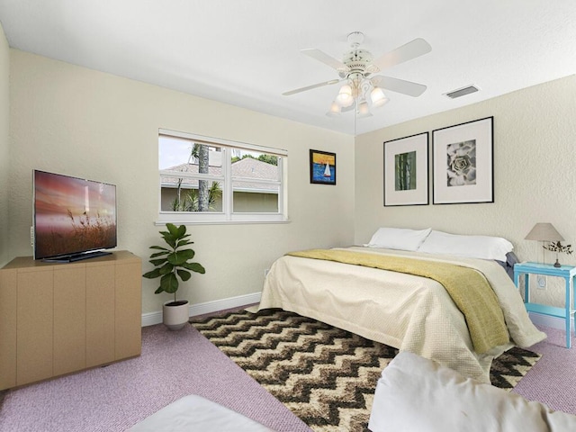 bedroom featuring ceiling fan and carpet floors