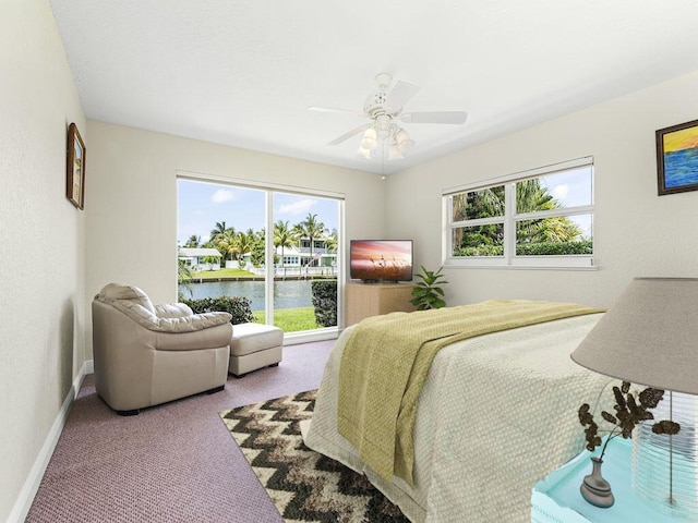 bedroom with light colored carpet and ceiling fan