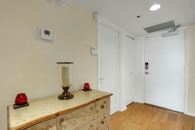 hallway featuring light wood-type flooring