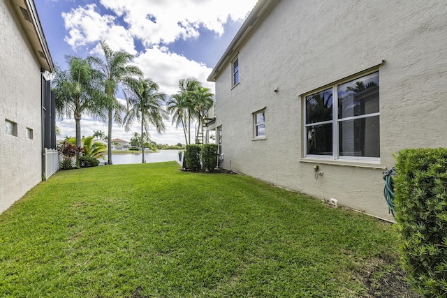 view of yard with a water view