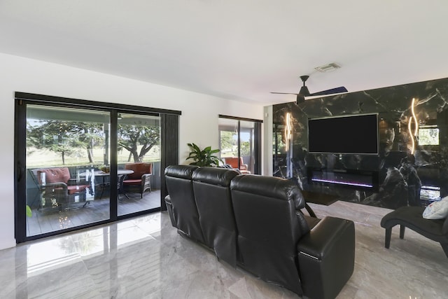 living room with ceiling fan