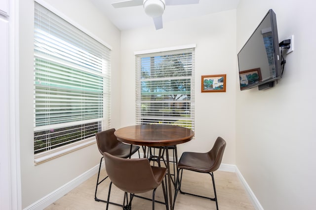 dining area featuring ceiling fan and light hardwood / wood-style floors