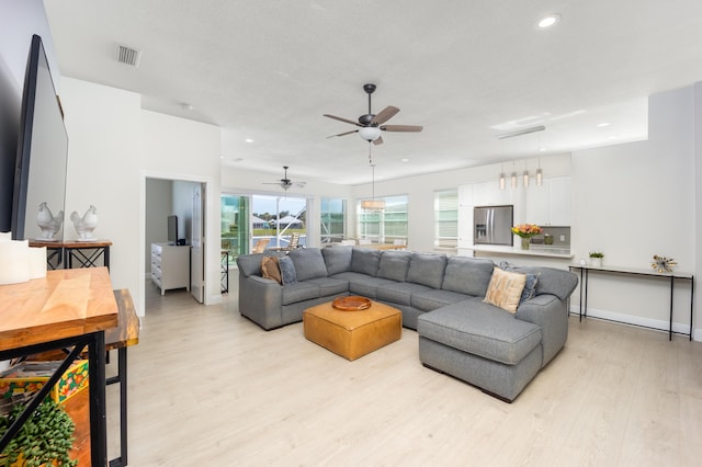 living room featuring light wood-type flooring