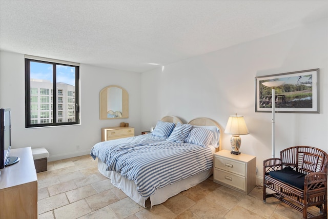 bedroom with a textured ceiling