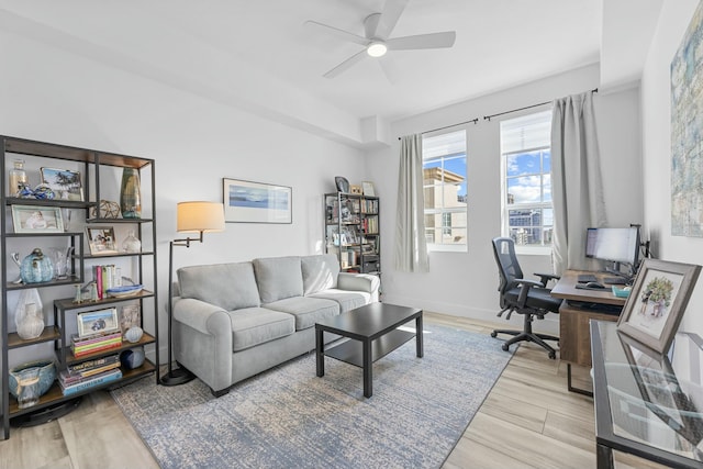 office featuring ceiling fan and light wood-type flooring