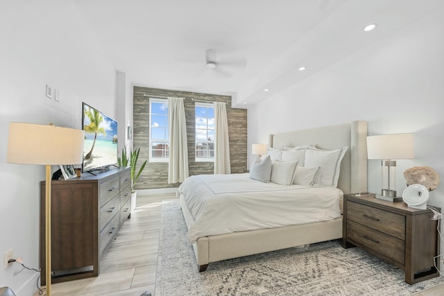 bedroom with light wood-type flooring and ceiling fan