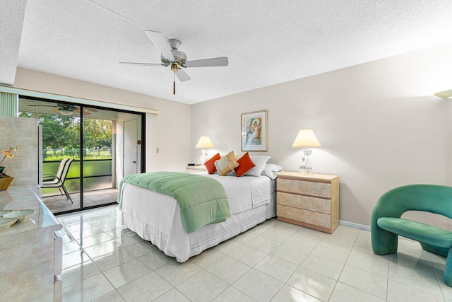 bedroom featuring access to exterior, light tile patterned floors, a textured ceiling, and ceiling fan