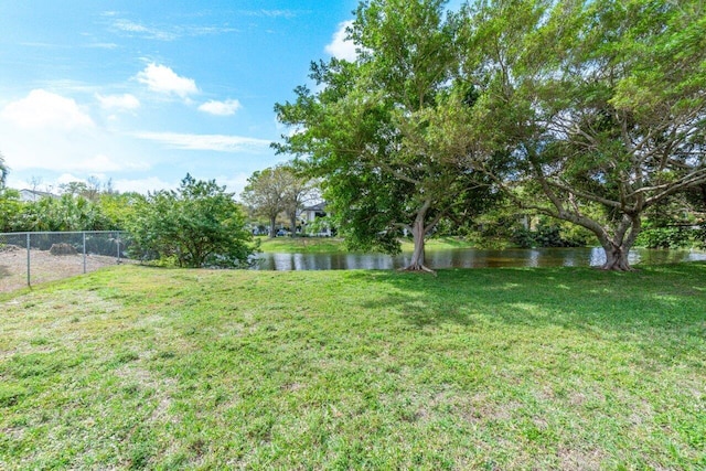 view of yard with a water view