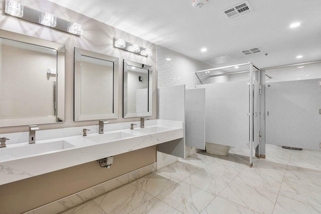 bathroom featuring vanity and walk in shower