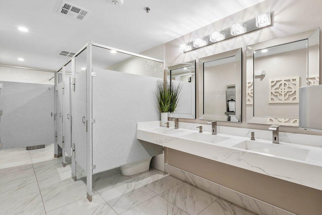 bathroom with vanity and walk in shower