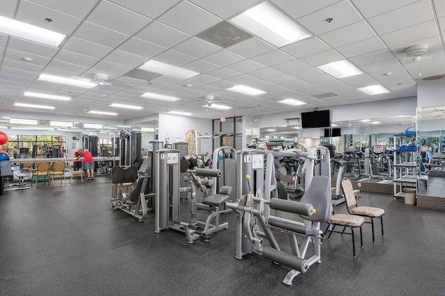 exercise room with a drop ceiling