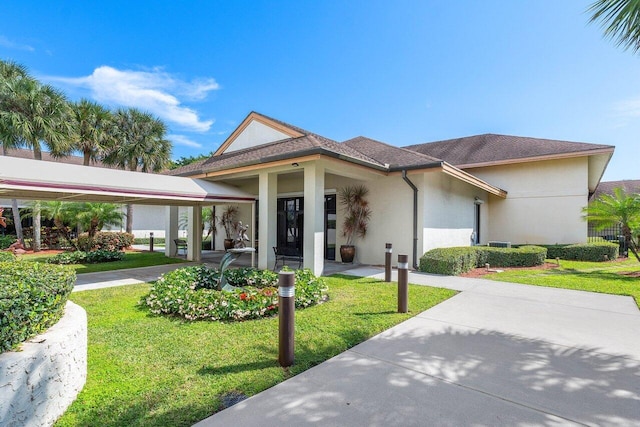 view of front of house with a front yard