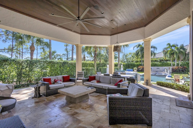 view of patio with ceiling fan, an outdoor hangout area, and a swimming pool