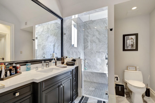 bathroom featuring vanity, a shower with shower door, vaulted ceiling, and toilet