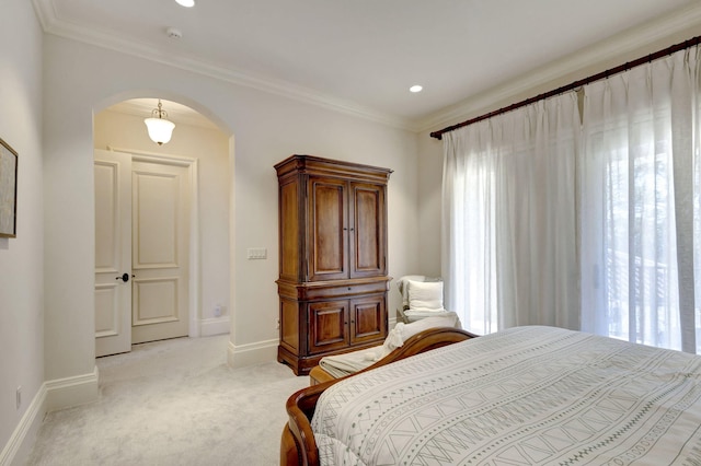 carpeted bedroom with crown molding