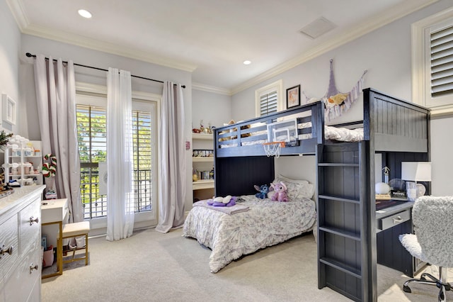 bedroom with carpet floors and crown molding