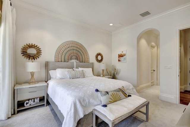 carpeted bedroom with crown molding