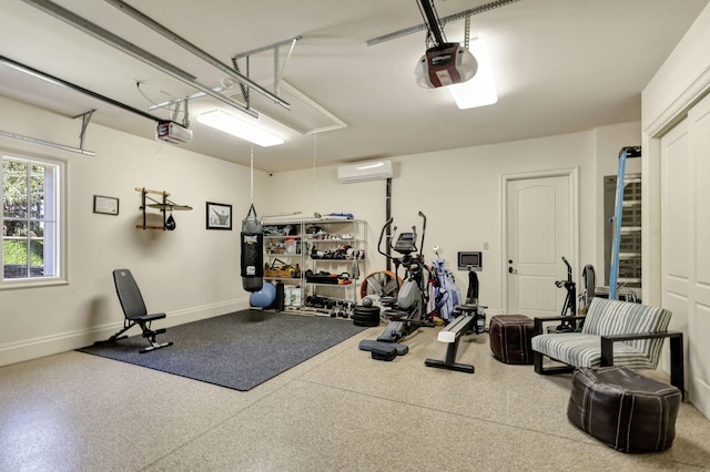 exercise area featuring a wall mounted air conditioner