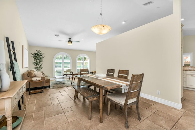 dining area with ceiling fan