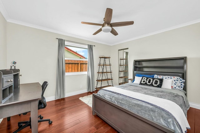 bedroom featuring ceiling fan, crown molding, and dark wood-type flooring