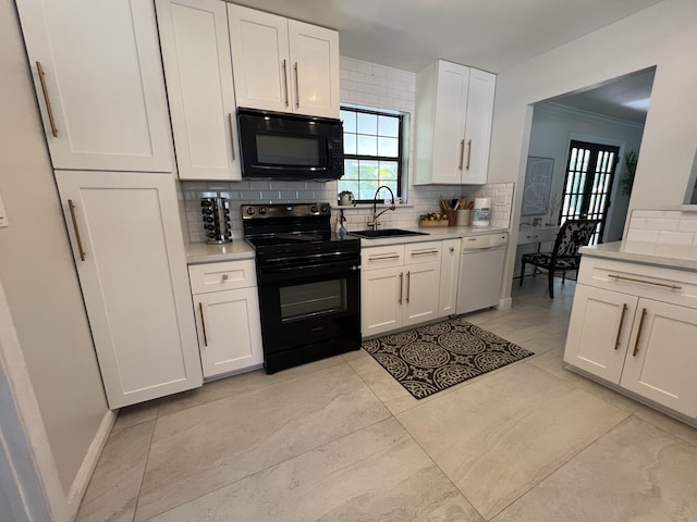 kitchen with black appliances, white cabinets, sink, tasteful backsplash, and light tile patterned flooring