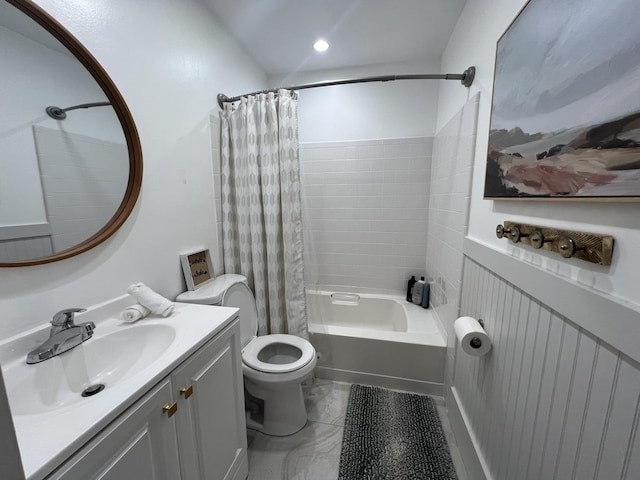 full bathroom featuring shower / bath combo, toilet, and vanity