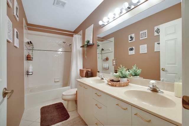 full bathroom with toilet, shower / bath combo, vanity, and tile patterned floors