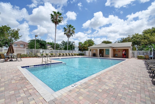 view of swimming pool featuring a patio area