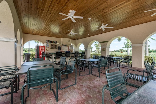 view of patio / terrace featuring ceiling fan