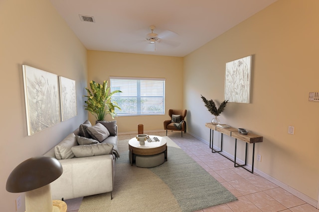 living room with light tile patterned floors and ceiling fan