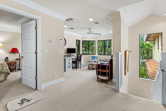 interior space featuring crown molding, a healthy amount of sunlight, vaulted ceiling, and light carpet