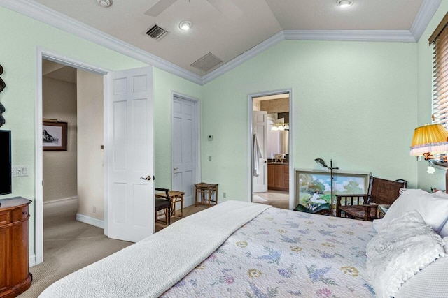 bedroom with lofted ceiling, crown molding, ceiling fan, and carpet flooring