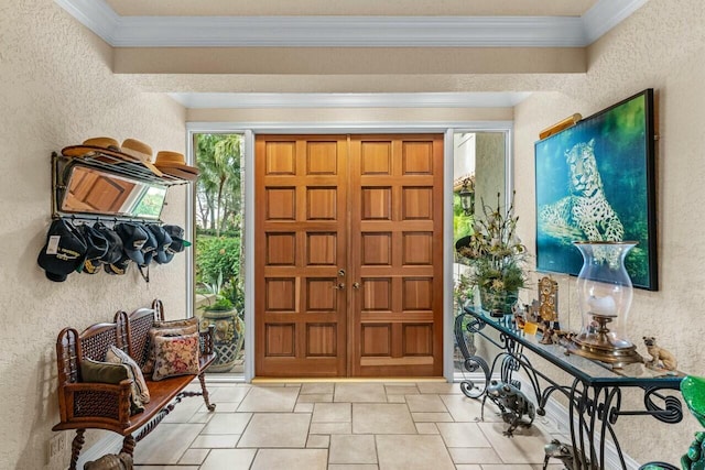 entrance foyer featuring ornamental molding