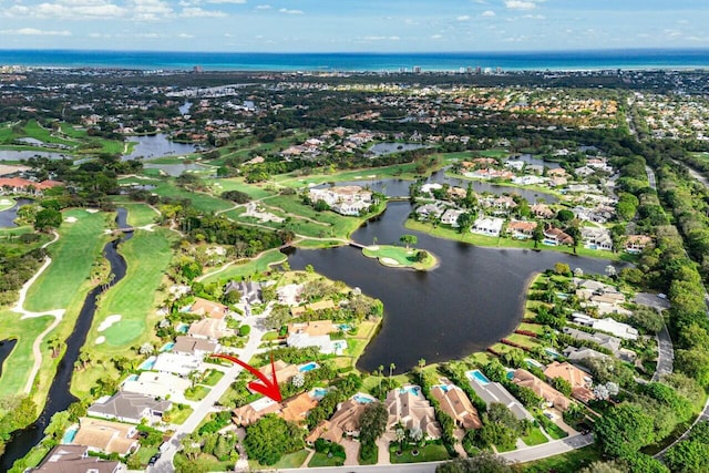 bird's eye view with a water view