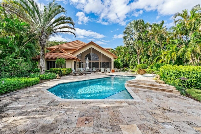 view of pool featuring a patio area