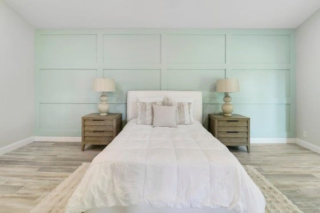 bedroom featuring light wood-type flooring