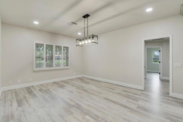 unfurnished dining area with light hardwood / wood-style floors