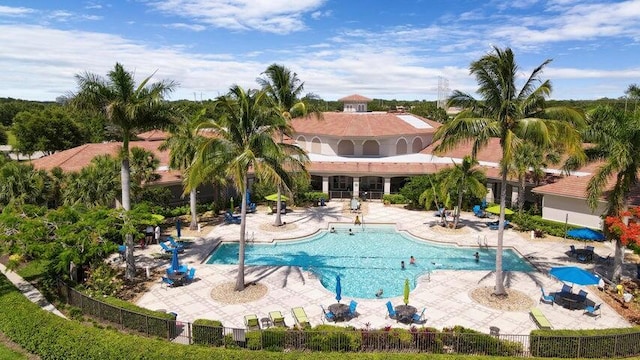 view of pool featuring a patio area