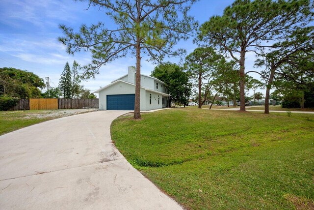 view of pool with a yard and a patio