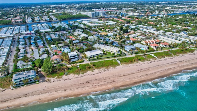 aerial view featuring a water view and a view of the beach