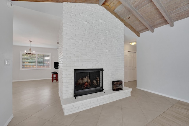 unfurnished living room featuring a brick fireplace, vaulted ceiling with beams, a chandelier, light tile patterned floors, and wood ceiling