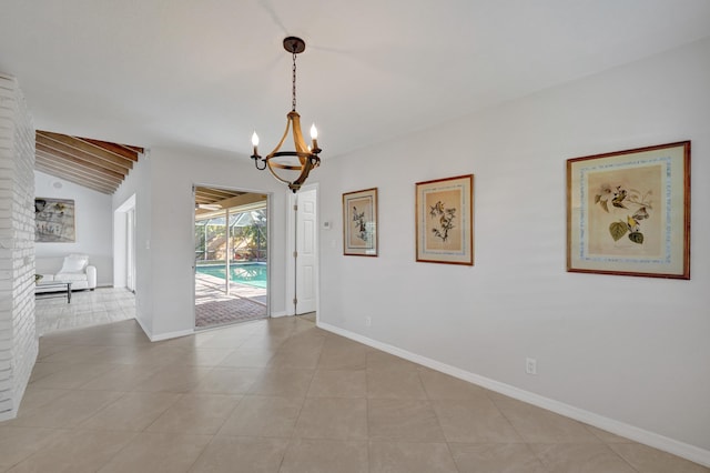 unfurnished room featuring vaulted ceiling with beams and an inviting chandelier