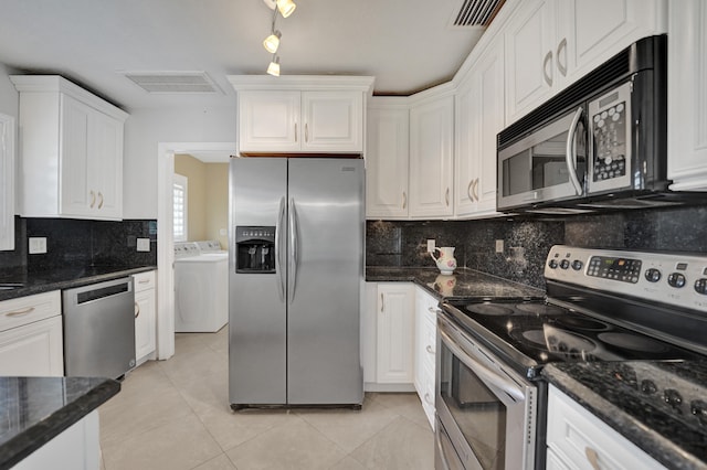 kitchen with stainless steel appliances and white cabinetry