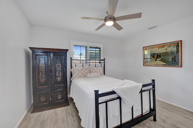 bedroom featuring light hardwood / wood-style flooring and ceiling fan