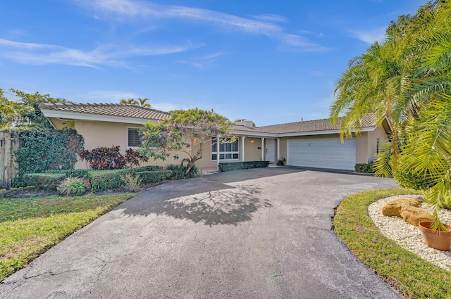 single story home with a garage